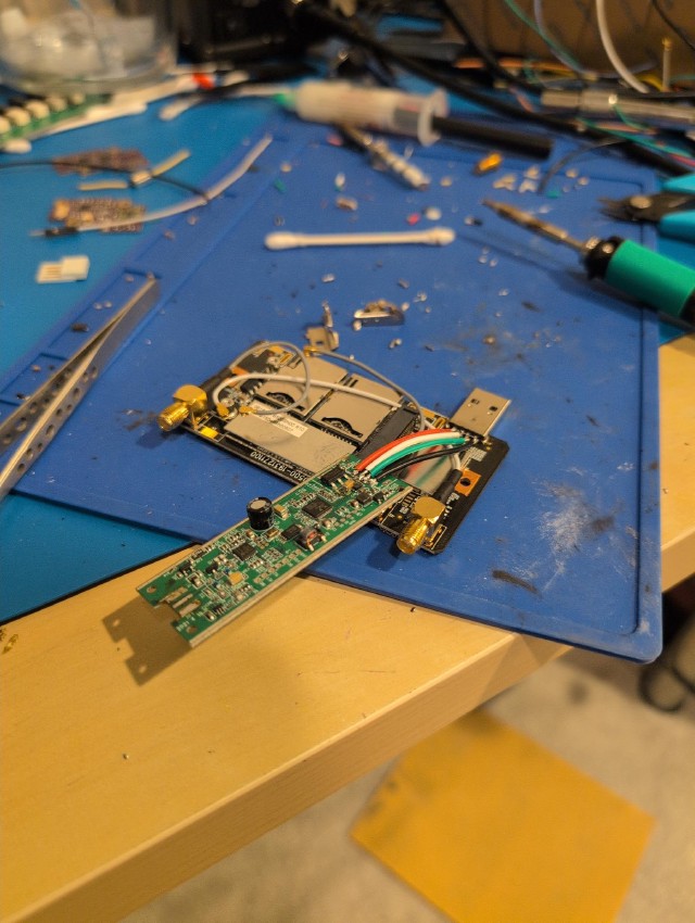 Main Cradlepoint board and RTL-SDR board connected with silicone wire