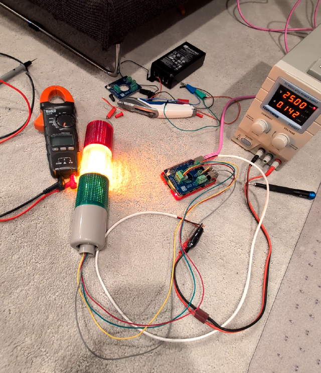 Two boards, power supply, and debug wires