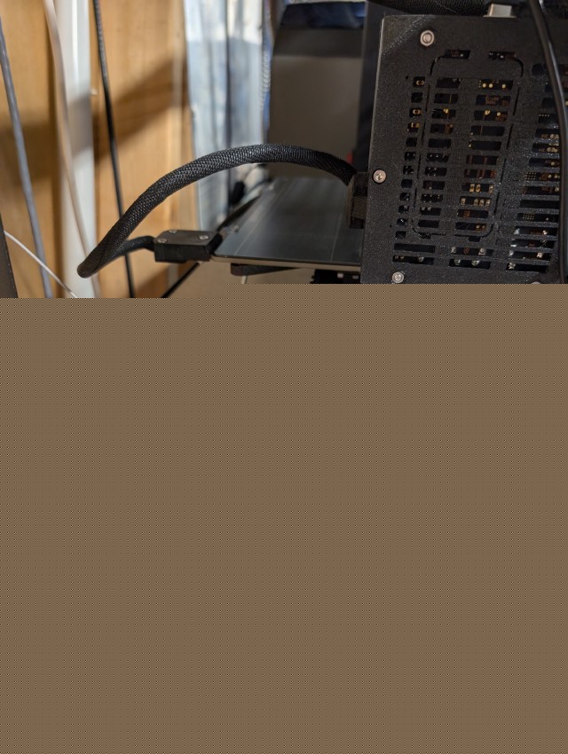Hat on a Pi with wires coming out of it, connected to my printer