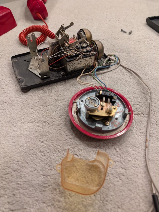 Phone dial mechanism exposed