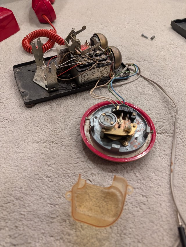Phone dial mechanism exposed